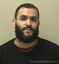 Mugshot of OMAR R BAEZ