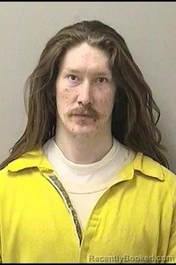 Mugshot of SIMON A HUNTER