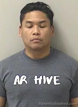 Mugshot of ARTHUR E TIONGSON