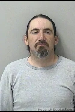 Mugshot of JESUS ENRIQUEZ MARTINEZ booked in Kane County, Illinois on April 4, 2026