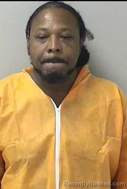 Mugshot of TREX L MOORE booked in Kane County, Illinois on April 4, 2026