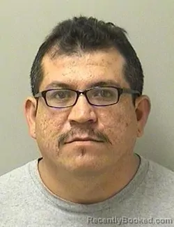 Mugshot of RUBEN SANTOYO booked in Kane County, Illinois on April 14, 2026