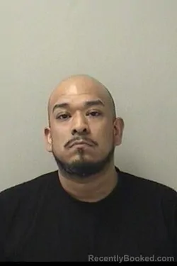 Mugshot of ROBERTO J RUIZ booked in Kane County, Illinois on April 14, 2026