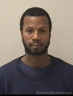 Mugshot of OMAR JARRIEL COTTRELL booked in Kane County, Illinois on April 16, 2026