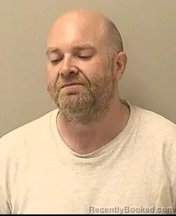 Mugshot of JONATHAN A MALNARICK booked in Kane County, Illinois on April 17, 2026