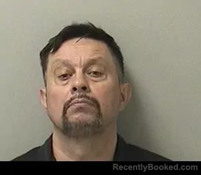 Mugshot of ANDRZEJ D HANKUS booked in Kane County, Illinois on April 22, 2026