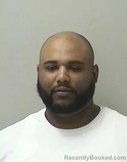 Mugshot of GIOVONNI L RHODES booked in Kane County, Illinois on April 24, 2026