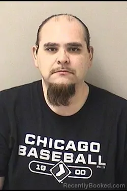 Mugshot of JOSE L REYNOSA booked in Kane County, Illinois on April 25, 2026