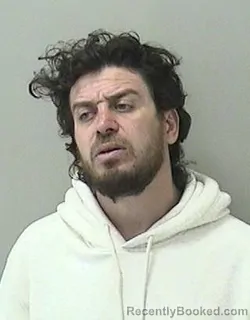 Mugshot of MUSATDIN MUADINOV booked in Kane County, Illinois on April 25, 2026