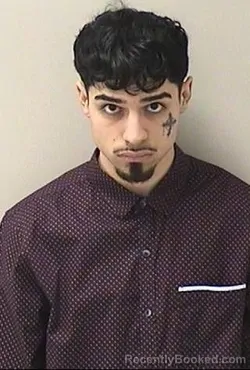 Mugshot of EDGAR E OLIVARES booked in Kane County, Illinois on April 27, 2026
