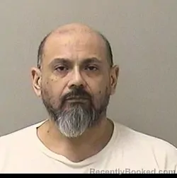 Mugshot of DANIEL ENRIQUE GUERRERO booked in Kane County, Illinois on April 27, 2026