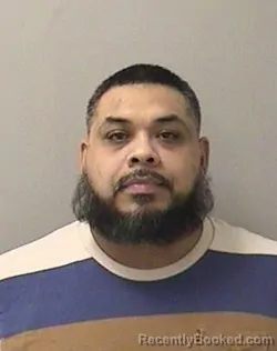 Mugshot of FRANK OBRIEN DELGADO booked in Kane County, Illinois on May 4, 2026