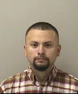 Mugshot of CRISTIAN B NAVARRO booked in Kane County, Illinois on May 7, 2026
