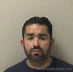 Mugshot of REYNALDO DELACRUZ booked in Kane County, Illinois on May 7, 2026