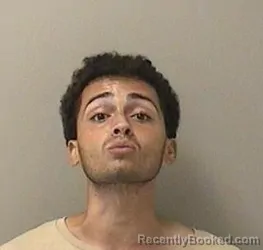 Mugshot of ERIC M RAMOS booked in Kane County, Illinois on May 8, 2026