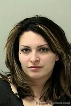 Mugshot of SHANNON KAE GARZA booked in Kane County, Illinois on May 10, 2026