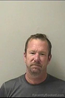 Mugshot of MARK C OLSON booked in Kane County, Illinois on May 11, 2026
