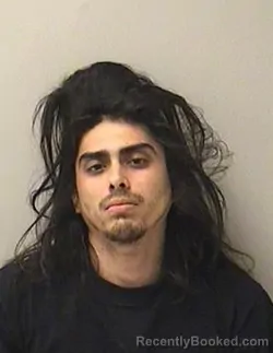 Mugshot of ERIC SALAZAR booked in Kane County, Illinois on June 20, 2026