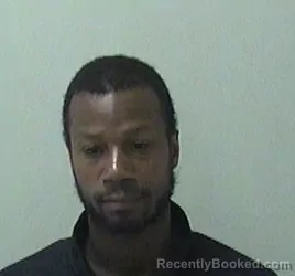 Mugshot of OMAR JARRIEL COTTRELL booked in Kane County, Illinois on July 3, 2026