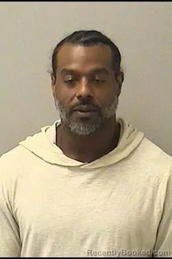 Mugshot of Jason Manuel Ortiz booked in Kane County, Illinois on August 8, 2026