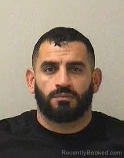Mugshot of Niyaz Begzada Usmanov booked in Kane County, Illinois on August 17, 2026