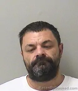 Mugshot of Przemyslaw Bujalski booked in Kane County, Illinois on August 24, 2026