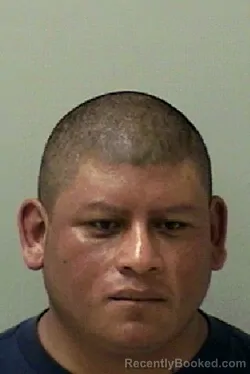Mugshot of Macario Vazquez-Espinosa booked in Kane County, Illinois on August 26, 2026