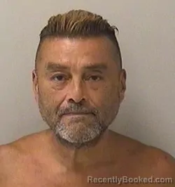 Mugshot of Robert Giovanni Morales booked in Kane County, Illinois on August 28, 2026