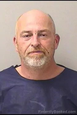 Mugshot of Christian Bradley Flores booked in Kane County, Illinois on September 2, 2026