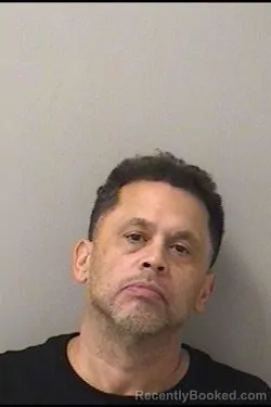Mugshot of Alisandro Alex Martinez booked in Kane County, Illinois on September 6, 2026