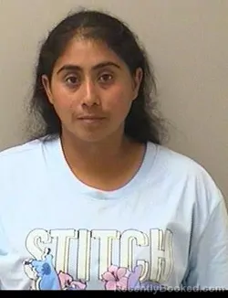 Mugshot of Lizbeth Garcia Bautista booked in Kane County, Illinois on September 7, 2026