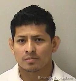 Mugshot of Juan C Manuel Garcia booked in Kane County, Illinois on September 9, 2026
