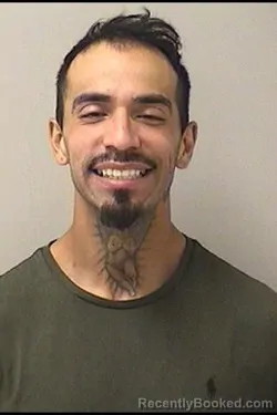 Mugshot of Angel Luis Ruiz booked in Kane County, Illinois on September 12, 2026