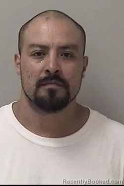 Mugshot of Oscar Espinoza Villagomez booked in Kane County, Illinois on October 6, 2026