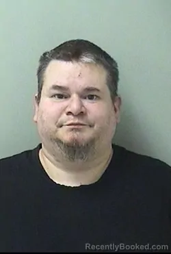 Booking photo from Kane County, Illinois