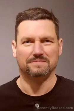 Mugshot of JUSTIN EDWARD HUDETZ