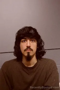 Mugshot of DOMINIC NOEL NEVAREZ booked in Kendall County, Illinois on March 11, 2026