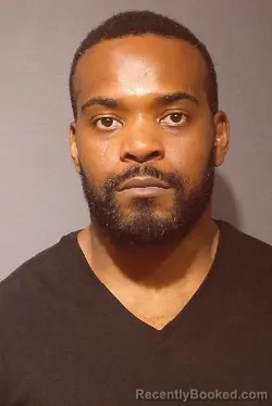 Mugshot of TOM NUWOE GBEAN booked in Kendall County, Illinois on March 26, 2026