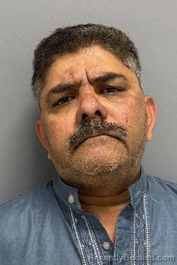 Mugshot of VIKHARUDDIN UDDIN AHMED booked in Kendall County, Illinois on June 24, 2026