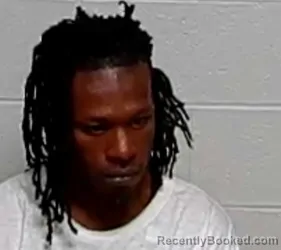 Mugshot of HASSAN ALI GRANT booked in Lake County, Illinois on April 2, 2026