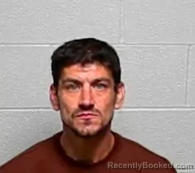 Mugshot of Enrique R Roman booked in Lake County, Illinois on October 8, 2026