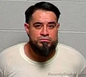 Mugshot of HERBERT Y NAJARRO