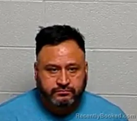 Mugshot of EVARISTO CORTES-PARRA