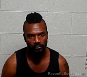 Mugshot of JORDAN B MOORE