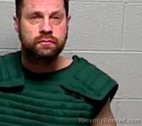 Mugshot of JUSTIN R ESSER