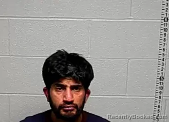Mugshot of MOHAMMAD ALI QASMI booked in Lake County, Illinois on April 27, 2026