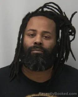 Mugshot of JUSTIN B MITCHELL