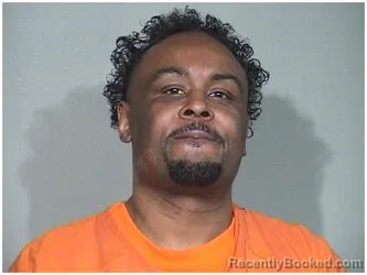 Mugshot of MARLON A RHODES booked in McHenry County, Illinois on May 7, 2026