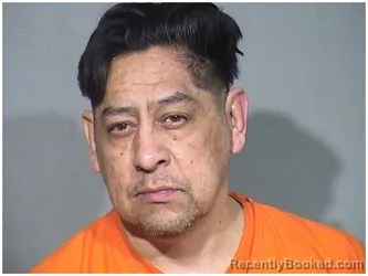 Mugshot of JUAN M BRAVO