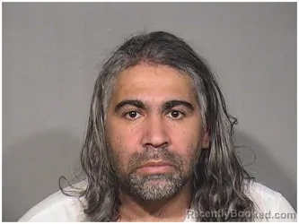 Mugshot of CARLOS P ROSARIO booked in McHenry County, Illinois on April 26, 2026